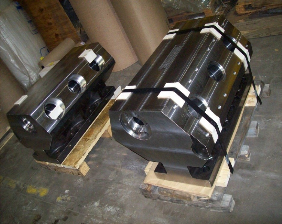 a group of oil pumps sitting on top of a field