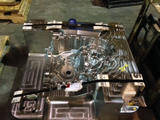 white sedan on a parking lot